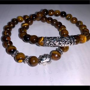 A brown bracelet with charms